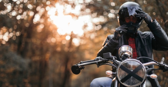 Motorcycle rider on Texas trail