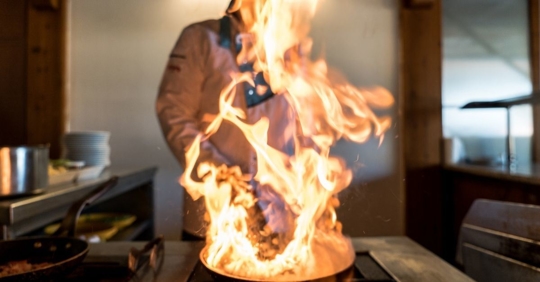 fire coming from a pan
