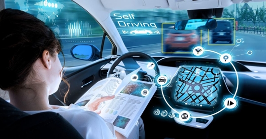 woman sitting in the driver's seat of a car on the highway, AI-related symbols are floating around and it says "Self-driving." The woman is reading a textbook and not looking at the road.