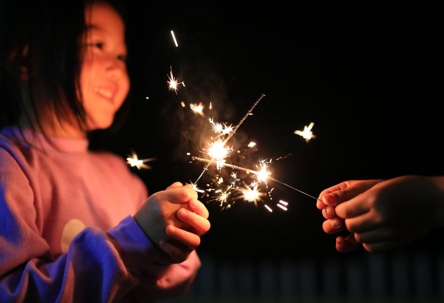 kid with sparkler