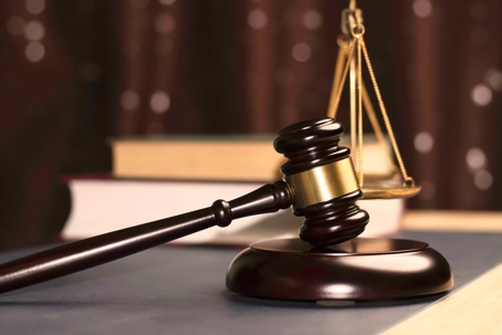 Lawyer's hand concept Justice with Judge gavel, Businessman in suit or Hiring lawyers in the digital system. Legal law, prosecution, legal adviser, lawsuit, detective, investigation,legal consultant.